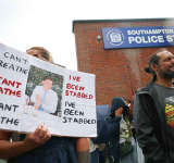 UK police under pressure after  dying student was handcuffed